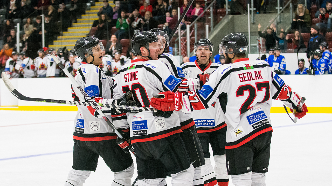 Team celebrates first goal at Ice Arena Wales